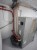 HERKULES INOX 20 kW w Lubartowie – boczny widok kotła, podajnika i przewodu spalinowego